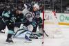 LINDSEY WASSON / THE ASSOCIATED PRESS
                                Winnipeg Jets&rsquo; Nino Niederreiter (centre) battles for the puck against the Seattle Kraken. The winger admits his offensive drought is starting to wear on him.