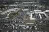 An aerial view shows auto dealerships in Cerritos, Calif., Thursday, March 27, 2025. (AP Photo/Jae C. Hong)