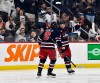Winnipeg Jets' Neal Pionk (4) celebrates his goal against the Carolina Hurricanes with Alex Iafallo (9) during the second period of their NHL hockey game in Winnipeg, Tuesday February 4, 2025. THE CANADIAN PRESS/Fred Greenslade