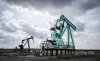 A decommissioned pumpjack, right, sits idle beside a functioning one drawing out oil and gas from a well head near Carstairs, Alta., Tuesday, April 1, 2025. Canada has the third largest oil reserves in the world and is the world's fourth largest oil producer. THE CANADIAN PRESS/Jeff McIntosh