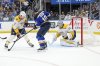Nashville Predators goaltender Justus Annunen (29) stops the puck as Nashville Predators' Luke Schenn (2) and St. Louis Blues' Brayden Schenn (10) battle during the second period of an NHL hockey game Friday, Dec. 27, 2024, in St. Louis. (AP Photo/Scott Kane)
