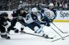 Kyusung Gong / THE ASSOCIATED PRESS
                                Winnipeg Jets&rsquo; Mark Scheifele (centre right) controls the puck as the Los Angeles Kings jockey for positioning during the third period on Tuesday in Los Angeles.