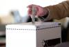 CHRIS YOUN / THE CANADIAN PRESS FILES
                                A man casts his vote for the federal election.
