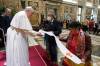 VATICAN MEDIA
                                Former national chief of the Assembly of First Nations Phil Fontaine (centre) and residential school survivor Linda Daniels from the Long Plains First Nation (right), present Pope Francis with a stole that was made by��Therese Dettanikkeaze from Northlands Denesuline Nation in Manitoba, at the Vatican, on April 1, 2022. The Pope will visit Canada in July, the Vatican announced Friday. ()