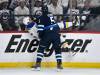 Fred Greenslade / THE CANADIAN PRESS
                                Winnipeg Jets&rsquo; Luke Schenn (5) checks St. Louis Blues&rsquo; Jordan Kyrou (25) during first period playoff action at Canada Life Centre on Monday.