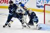 Fred Greenslade / THE CANADIAN PRESS
                                Winnipeg Jets Neal Pionk (left) defends as goaltender Connor Hellebuyck (right) makes a save on St. Louis Blues captain Brayden Schenn (centre) during Game 2 at Canada Life Centre on Monday.