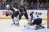 Connor Hamilton / THE ASSOCIATED PRESS
                                Winnipeg Jets&rsquo; Connor Hellebuyck (right) and Vladislav Namestnikov (left) defend the net against the Blues&rsquo; Jake Neighbours at Enterprise Center Sunday afternoon in St. Louis.