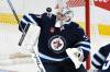 Fred Greenslade / THE CANADIAN PRESS
                                Winnipeg Jets goaltender Connor Hellebuyck makes a save on the St. Louis Blues at Canada life Centre.