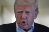 President Donald Trump talks with reporters on Air Force One as he heads back to Washington, from West Palm Beach, Fla., Sunday, May 4, 2025. THE CANADIAN PRESS/AP-Manuel Balce Ceneta