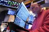 Trader Vincent Napolitano works on the floor of the New York Stock Exchange, Thursday, April 17, 2025. (AP Photo/Richard Drew)