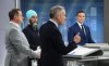 Conservative Leader Pierre Poilievre, New Democratic Party Leader Jagmeet Singh and Bloc Quebecois Leader Yves-Francois Blanchet listen as Liberal Leader Mark Carney speaks during the French-language federal leaders' debate, in Montreal, Wednesday, April 16, 2025. THE CANADIAN PRESS/Sean Kilpatrick