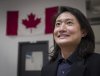 New Canadian Naiwen Cao, who works at the Centre for Newcomers, will be voting for the first time in his life in the upcoming election and is pictured at the centre in  Calgary, Thursday, April 17, 2025.THE CANADIAN PRESS/Jeff McIntosh
