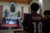 Fans of San Lorenzo soccer club attend a Mass at San Antonio Parish in honor of the late Pope Francis, a lifelong supporter of the club, in Buenos Aires, Argentina, Wednesday, April 23, 2025. (AP Photo/Natacha Pisarenko)