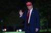 President Donald Trump waves to reporters as he walks on the South Lawn of the White House in Washington on Tuesday, April 29, 2025. THE CANADIAN PRESS/AP-Jose Luis Magana