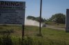 Canadian law enforcement personnel rush to a home on the James Smith Cree First Nation reservation in Saskatchewan, Tuesday, Sept. 6, 2022. THE CANADIAN PRESS/AP-Robert Bumsted