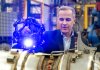 Liberal Leader Mark Carney uses a quality control scanning device during a campaign stop at Armo-tool in London, Ont., on Wednesday March 26, 2025. THE CANADIAN PRESS/Frank Gunn