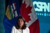 Alberta Premier Danielle Smith responds to a question following a speech at the Canada Strong and Free Network national conference, Thursday, April 10, 2025 in Ottawa.  THE CANADIAN PRESS/Adrian Wyld