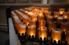 Votive candles are lit inside St. Michael's Cathedral Basilica in Toronto after the death of Pope Francis, on Monday, April 21, 2025. THE CANADIAN PRESS/Laura Proctor
