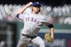 Texas Rangers starting pitcher Jacob deGrom throws during the first inning of a baseball game against the Washington Nationals, Saturday, June 7, 2025, in Washington. (AP Photo/Nick Wass)