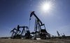 A pumpjack works a well head near Calgary, Alta., Tuesday, May 6, 2025. THE CANADIAN PRESS/Jeff McIntosh