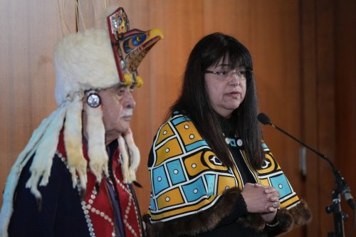 Heiltsuk Nation Chief Marilyn Slett, right, speaks as Hereditary Chief Wigvilhba Wakas Harvey Humchitt Sr. listens during a news conference, in Vancouver, Tuesday, Feb. 25, 2025. THE CANADIAN PRESS/Darryl Dyck