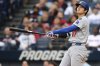 Los Angeles Dodgers' Shohei Ohtani watches his ball after hitting a two run home run off Cleveland Guardians starting pitcher Tanner Bibee during the fourth inning of a baseball game, Tuesday, May 27, 2025, in Cleveland. (AP Photo/David Dermer)