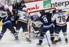 St. Louis Blues goaltender Jordan Binnington (50) saves the shot from Winnipeg Jets&rsquo; Cole Perfetti (91) during first period NHL playoff action in Winnipeg on Wednesday. (John Woods / The Canadian Press)