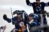 Winnipeg Jets&rsquo; Adam Lowry (17) celebrates his game-winning goal against the St. Louis Blues with Haydn Fleury (24) in the second overtime period of NHL round one, game seven Stanley Cup playoff action in Winnipeg, Sunday, May 4, 2025. (Fred Greenslade / The Canadian Press)