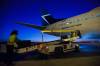 MIKE DEAL / FREE PRESS FILES
                                Airport baggage-handling crews load up a WestJet flight at Winnipeg&rsquo;s airport.