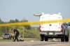 TIM SMITH / BRANDON SUN
                                Investigators Tuesday at the scene of a police shooting that happened on the Trans-Canada Highway west of Carberry the night before.