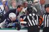 Winnipeg Jets head coach Scott Arniel, left, talks with referee Chris Rooney (5) in the third period of Game 3 of a second-round NHL hockey playoff series against the Dallas Stars in Dallas, Sunday, May 11, 2025. (AP Photo/Julio Cortez)