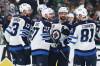 Gareth Patterson / The Associated Press
                                Winnipeg Jets Gabriel Vilardi, Nikolaj Ehlers, Luke Schenn, Josh Morrissey and Kyle Connor celebrate after Ehlers scored against the Dallas Stars in the second period of Game 4 of their second-round NHL hockey playoff series in Dallas, Tuesday.