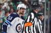 GARETH PATTERSON / ASSOCIATED PRESS
                                Winnipeg Jets&rsquo; Mark Scheifele (55) talks to referee Dan O&rsquo;Rourke (9) after Scheifele was issed a tripping penalty in the third period of Game 6 of a second-round NHL hockey playoff series against the Dallas Stars in Dallas, Saturday, May 17, 2025.