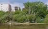 A large encampment along the embankment of the Assiniboine River at the end of Spence Street off of Balmoral Street. (Mike Deal / Free Press)