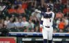 Houston Astros' Christian Walker (8) tosses the bat after being hit by a pitch from Athletics starting pitcher Luis Severino during the fourth inning of a baseball game, Wednesday, May 28, 2025, in Houston. (AP Photo/Karen Warren)