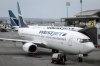 WestJet passenger jets parked at departure gates at the Calgary International Airport on Wednesday, May 31, 2023.THE CANADIAN PRESS/Jeff McIntosh