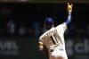 Milwaukee Brewers' Jackson Chourio gestures as he rounds the bases after hitting a solo home run during the first inning of a baseball game against the Boston Red Sox, Monday, May 26, 2025, in Milwaukee. (AP Photo/Aaron Gash)