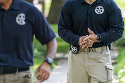 FILE - U.S. Marshals patrol outside the home of Supreme Court Justice Brett Kavanaugh in Chevy Chase, Md., June 8, 2022. (AP Photo/Jacquelyn Martin, File)