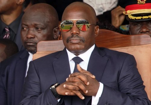 Outgoing president Joseph Kabila sits during the inauguration ceremony for Congolese President Felix Tshisekedi in Kinshasa, Democratic Republic of the Congo, Thursday Jan. 24, 2019. (AP Photo/Jerome Delay, File)