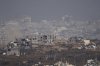 Israeli tanks manuver inside Gaza Strip as seen from southern Israel, Monday, May 26, 2025. (AP Photo/Ariel Schalit)