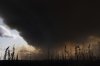 FILE - Wildfire smoke hangs in the air above Highway 97 north of Buckinghorse River, British Columbia, May 30, 2025. (Nasuna Stuart-Ulin/The Canadian Press via AP, File)