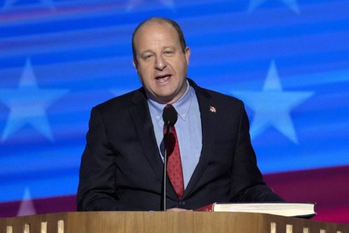FILE - Colorado Gov. Jared Polis speaks during the Democratic National Convention, Aug. 21, 2024, in Chicago. (AP Photo/J. Scott Applewhite, File)