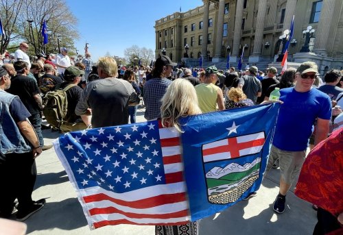 People gather in support of Alberta becoming the 51st U.S. state during a rally at the Legislature in Edmonton, on May 3. THE CANADIAN PRESS/Jason Franson