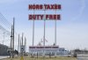 A sign for a duty free store at the Canada/U.S. border crossing in Saint-Bernard-de-Lacolle, Que., on Thursday, April 10, 2025. THE CANADIAN PRESS/Graham Hughes
