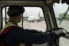 A ground crew looks over at a 42 year old Boeing 737-200 aircraft at Nolinor Aviation in Mirabel, Que., Saturday, May 17, 2025. THE CANADIAN PRESS/Christinne Muschi