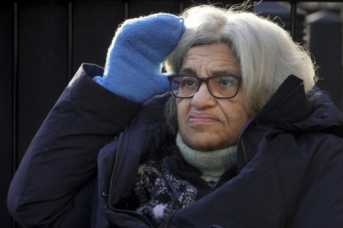 FILE - Laila Soueif, who has been on hunger strike for more than 129 days seeking the release of her son Alaa Abdel Fattah from prison in Egypt, sits outside Downing Street in London, Wednesday, Feb. 5, 2025. (AP Photo/Kirsty Wigglesworth, File)