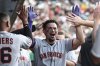 San Francisco Giants' Willy Adames celebrates in the dugout after hitting a solo home run during the fourth inning of a baseball game against the Athletics, Sunday, July 6, 2025, in West Sacramento, Calif. (AP Photo/Sara Nevis)