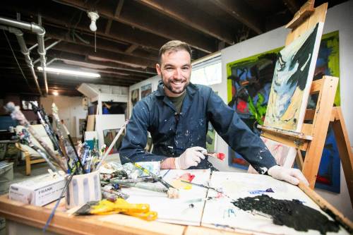 MIKAELA MACKENZIE / FREE PRESS
                                As a parent, painter and police officer &mdash; Brian Hunter juggles a demanding career and his passions.