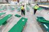MIKE DEAL / FREE PRESS FILES
                                Winnipeg Search and Rescue volunteers set up roughly 100 cots in the Eric Coy Arena in preparation for wildfire evacuees&rsquo; arrival last week.