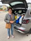 Aviva Tabac photo
                                Kavod Thrift Store volunteer Harriet Zimmer with load of donated items for Manitoba wildfire evacuees.
